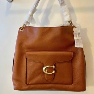 NEW, never used Coach purse with tags